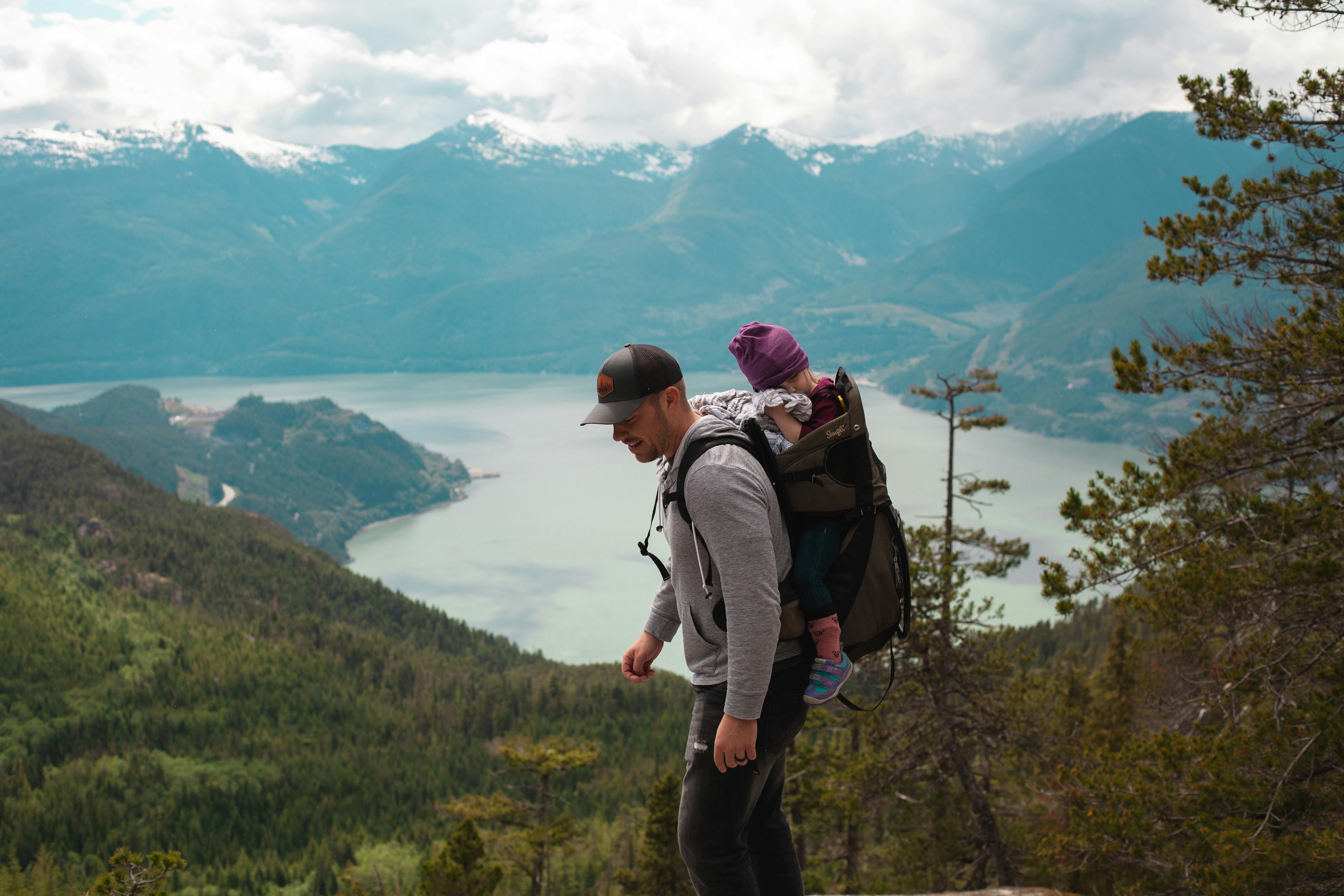 Dad hiking with baby in pack